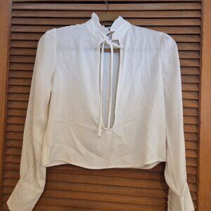 blouse with ruffled neckline